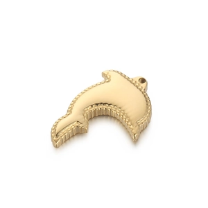 Polished golden stainless steel dolphin pendant with beaded edge on white background