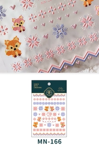 Macro view of MN-166 pixel art nail stickers featuring foxes and snowflakes textures