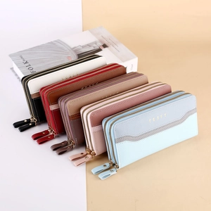 Detailed view of women's long wallets with dual zippers and litchi grain PU leather