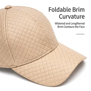 Quilted beige PU leather baseball cap with a wide curved brim and fashionable finish