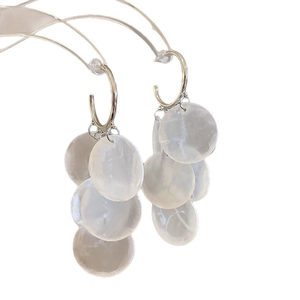 Elegant silver round earrings with white translucent fringe pendants and pearl accents