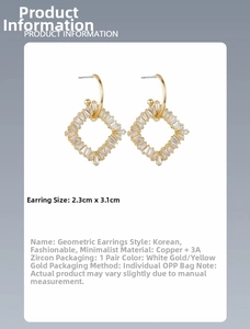 Detail view of geometric gold earrings with baguette-cut zircon stones and dimensions
