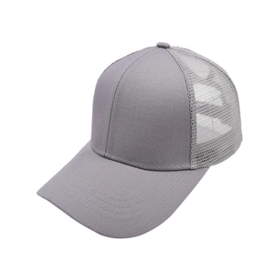 Detail of grey trucker hat featuring breathable mesh panels and reinforced stitching