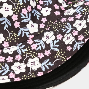 Close-up of floral bucket hat canvas fabric with durable parallel stitching details