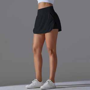 Detail view of high-waisted black cooling skort with inner shorts and hidden back pocket
