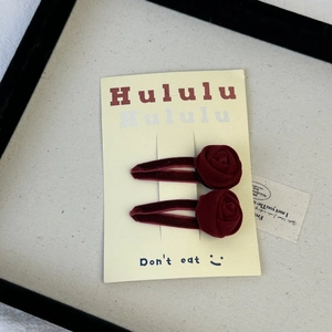 Pair of French vintage deep red velvet rose hair clips on branding display card