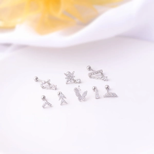 Set of 7 silver stainless steel screw back earrings with crystal butterfly and star designs
