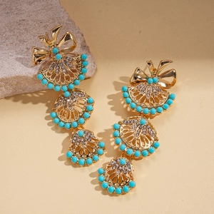 Elegant gold fan-shaped drop earrings with turquoise beads and sparkling rhinestones