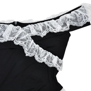 Close-up of black sleeveless bodysuit featuring elegant white lace ruffle neckline details