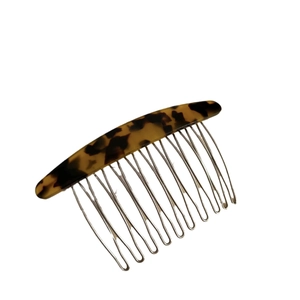 Tortoiseshell acetate hair side comb with 15 silver metal teeth on white background