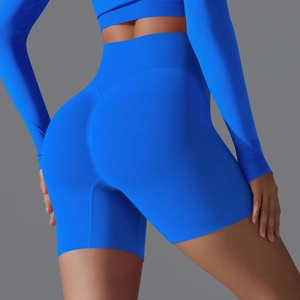 Detail of high-waist seamless yoga shorts with scrunch butt lift in vibrant Klein blue