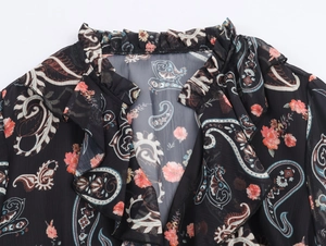 Women's black paisley chiffon tiered maxi dress with floral print and ruffled v-neckline