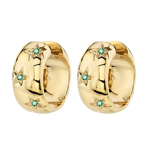 Detailed view of gold hoop earrings with star-carved green zircon stones