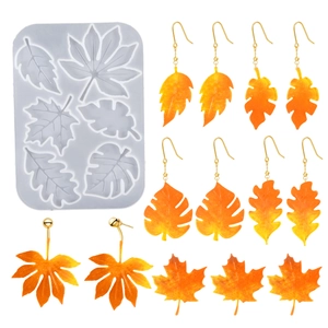 Vue macro du moule en silicone feuille d'érable avec boucles d'oreilles en résine finies