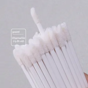 Bulk disposable eyelash cleaning swabs with white flocked tips and plastic handles