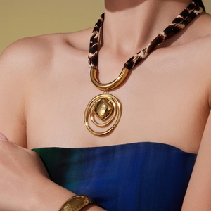 Leopard silk scarf necklace with gold heart pendant and hammered metal cuff bracelet