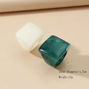 Minimalist resin rings set in cream white and dark green marble finish for women