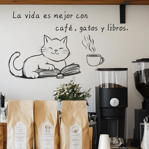 Black wall decal featuring a cat, book, and coffee with Spanish quote for kitchen decor