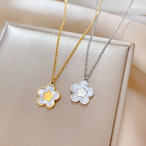 Titanium steel necklaces with mother of pearl star pendants in gold and silver finishes