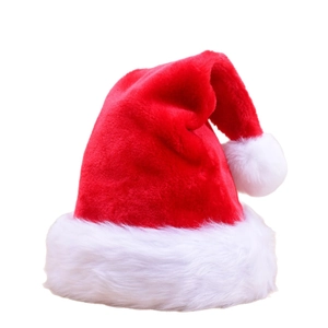 Classic plush red and white Christmas hat for adults and kids on white background