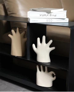 Modern ceramic hand gesture sculptures for jewelry storage in matte cream and khaki finish