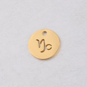 Detailed view of a gold 12mm mirror polished stainless steel Capricorn zodiac pendant