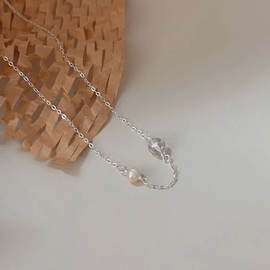 Elegant 925 sterling silver pearl necklace with a faceted crystal bead on a delicate chain
