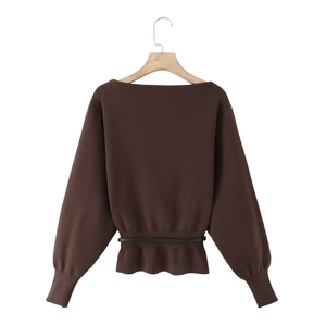 Elegant dark brown boat neck knit top with long sleeves, peplum hem and black waist belt