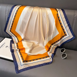 Elegant 90cm silk-like square scarf with orange and navy geometric patchwork patterns
