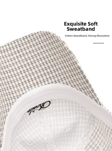 Detail of internal cotton sweatband on plaid baseball cap for better breathability