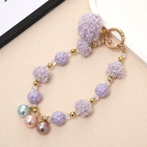 Handmade purple plush ball keychain with colorful pearls and golden lobster clasp
