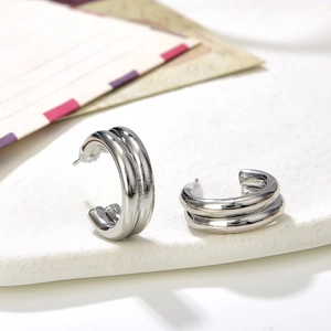 Polished silver double hoop earrings in a minimalist geometric hollow design for women
