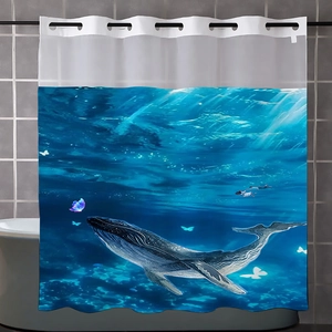 Detail of blue ocean shower curtain with whale print and mesh top for bathroom decor