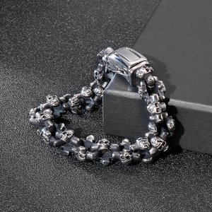 Detail of vintage gothic skull link bracelet with oxidized finish and secure clasp