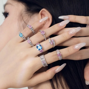 S925 sterling silver ring set with pink and blue gemstones and pavé-set accents on model