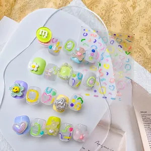 Detail of 3D handmade press-on nails with colorful jelly texture and floral charms