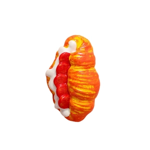Inflatable croissant shaped pool float in orange and yellow PVC for summer fun