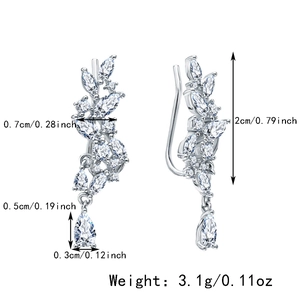 Detailed view of silver leaf zircon drop earrings with dimensions 2cm by 0.7cm