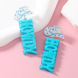 Macro shot of blue acrylic HOWDY letter earrings with silver glitter cowboy hat details