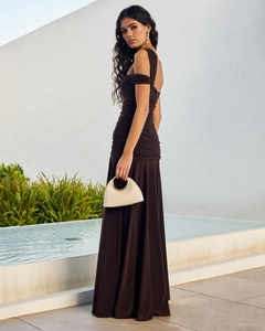 Detail of dark brown ruching dress with an asymmetrical shoulder and side slit design