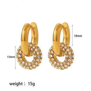 Detail of 18k gold earrings showing 18mm hoop and 15mm colorful rhinestone donut charms