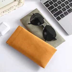 Chic mustard and olive PU leather eyewear pouches with auto-close spring clips