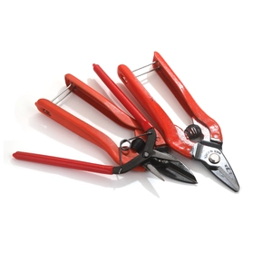 Three Korean-made red-handled jewelry pliers and pruning shears on white background
