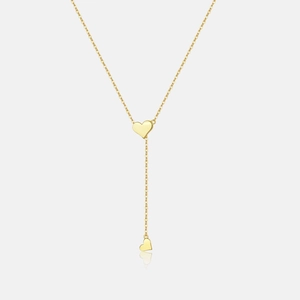 Detailed view of the gold double heart pendant on a Y-shaped lariat necklace