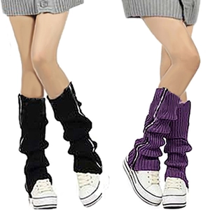 Detail of knitted leg warmers in black and purple with zipper closure and ribbed texture