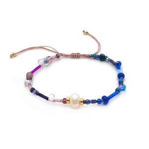 Handmade woven bracelet with natural freshwater pearls and colorful Japanese seed beads
