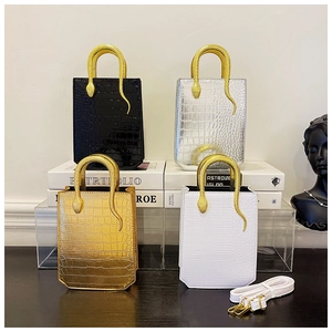 Detail of stone pattern tote bags with snake-shaped metal handles in four colors