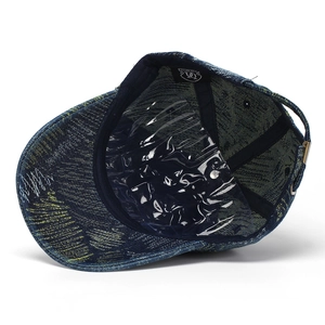 Internal view of a distressed denim baseball cap with sweatband and adjustable metal buckle