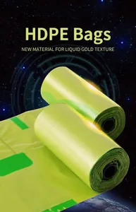 Detail of green HDPE pet waste bags in rolls with a metallic textured finish