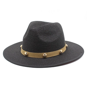 Ethnic retro straw panama hat with wide brim, black crown and studded decorative band
